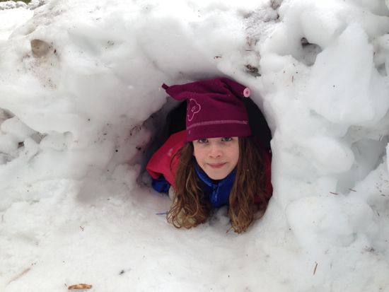 Caitlyn in a snow tunnel